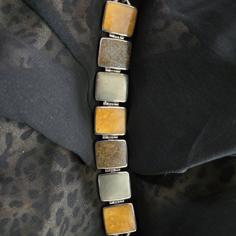 Classic Silver and Gold Bracelet with Uniform Design